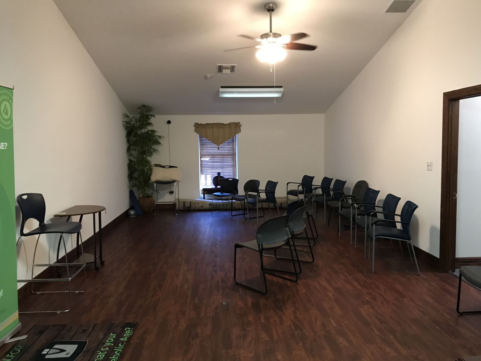 Empty meeting room with chairs in semicircle